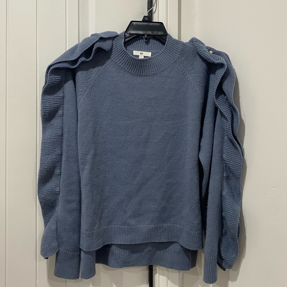 Blue sweater with pearls on the sides